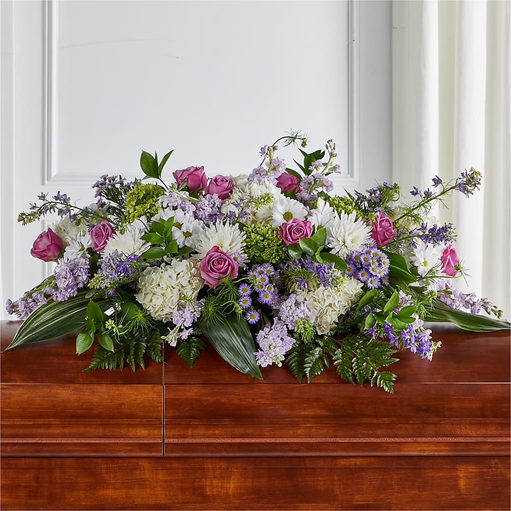 Meadows of Serenity Casket Spray – Tinys Flowers, Lansing IL